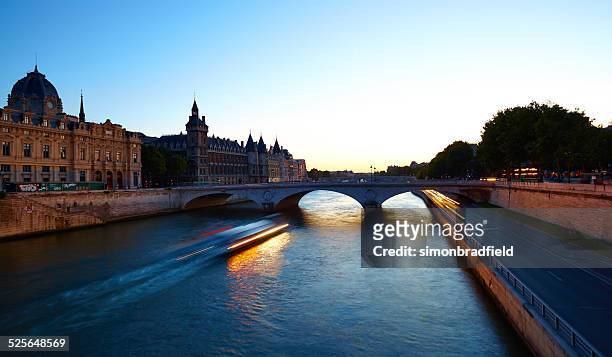 the river seine and paris by night - river cruise stock pictures, royalty-free photos & images