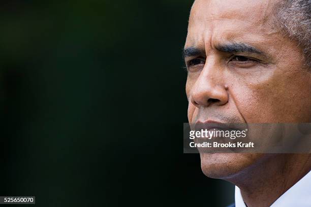 President Barack Obama participates in a joint press conference with and China President Xi Jinping in the Rose Garden at the White House in...