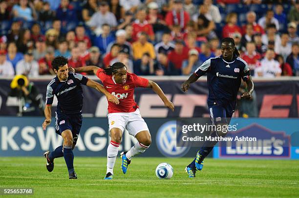 Benny Feilhaber of New England Revolution and Anderson of Manchester United