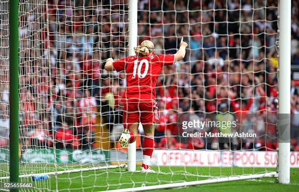 Andriy Voronin of Liverpool celebrates after scoring the fourth goal