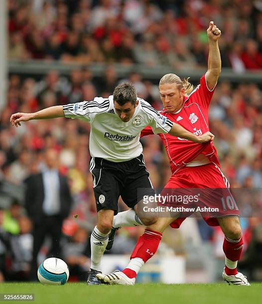 Andy Griffin of Derby County and Andriy Voronin of Liverpool