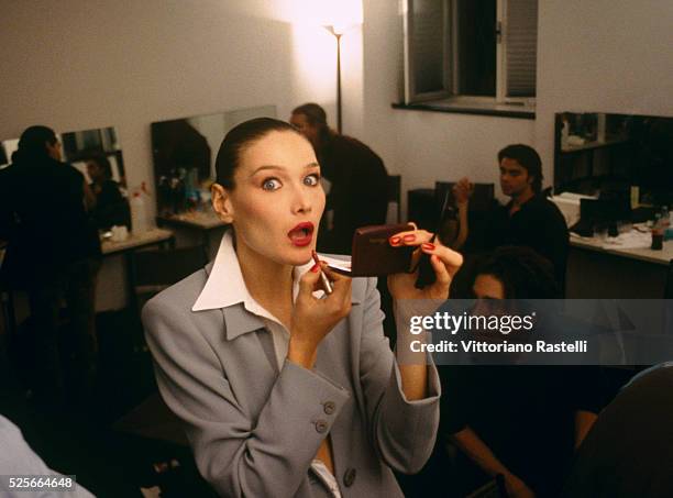 Italian-French top model Carla Bruni during makeup before a show.