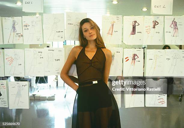 Italian-French top model Carla Brunii in the workshop of Italian fashion designer Miuccia Prada.