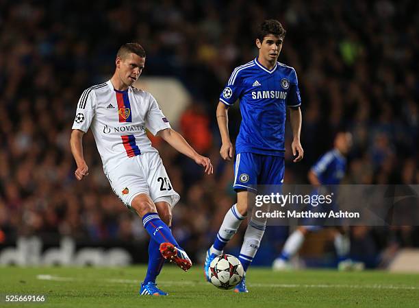 Fabian Frei of FC Basel and Oscar of Chelsea