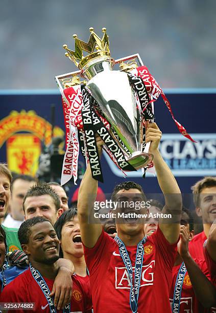 Cristiano Ronaldo of Manchester United lifts the FA Barclays Premier League trophy after winning the league season 2007-2008