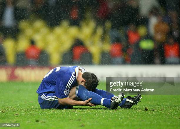 John Terry of Chelsea falls over whilst taking a penalty during the shoot out which lead to Manchester United winning the UEFA Champions League 2008...
