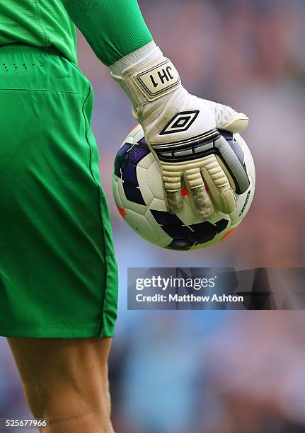 On the gloves of Joe Hart of Manchester City