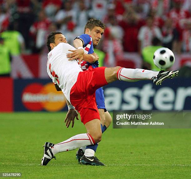 Dariusz Dudka of Poland gets the ball from Ivan Klasnic of Croatia during the EURO 2008 preliminary round group B soccer match between Poland and...