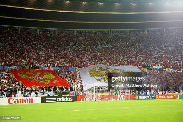 Russia fans wave flags during the UEFA EURO 2008 semi-final soccer match between Russia and Spain at the Ernst Happel stadium in Vienna, Austria.