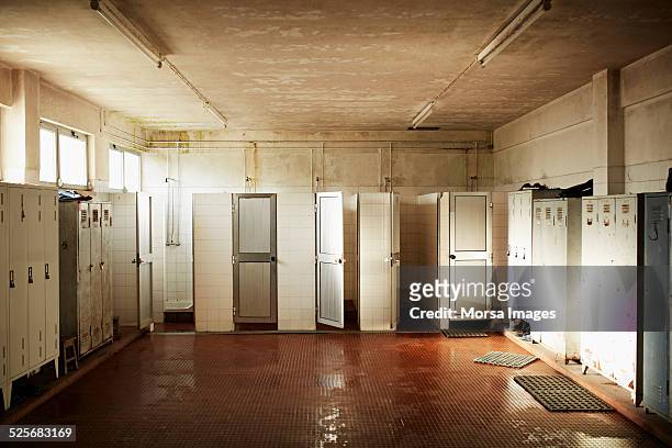 changing rooms in glass factory - locker room photos et images de collection