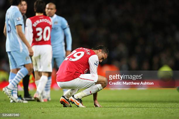 Dejected looking Marouane Chamakh of Arsenal