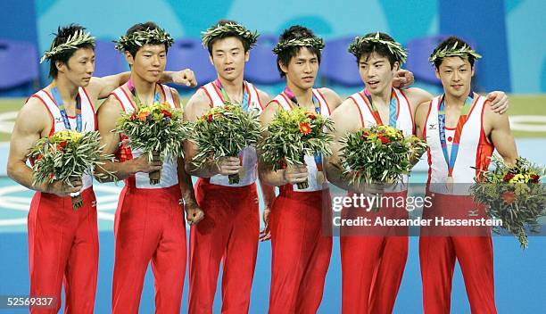 Kunstturnen: Olympische Spiele Athen 2004, Athen; Mehrkampf / Maenner / Mannschaft; Takehiro KASHIMA, Hisashi NIZUTORI, Daisuke NAKANO, Hiroyuki...