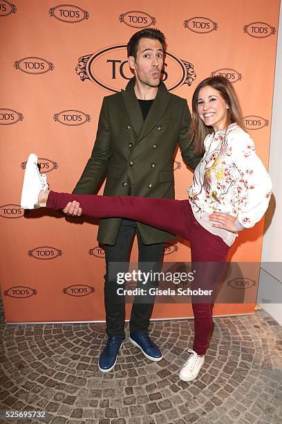 Alexander Mazza and -Karen Webb wearing Tod's shoes during the TOD'S 'The art of leather' party on April 28, 2016 in Munich, Germany.