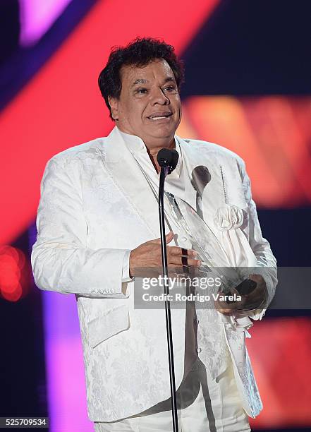 Juan Gabriel recieves price onstage at the Billboard Latin Music Awards at Bank United Center on April 28, 2016 in Miami, Florida.