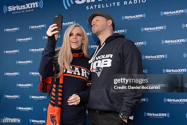 Jenny McCarthy and Donnie Wahlberg attend during Jenny McCarthy's SiriusXM show from Grant Park in Chicago, IL before the NFL Draft on April 28, 2016...