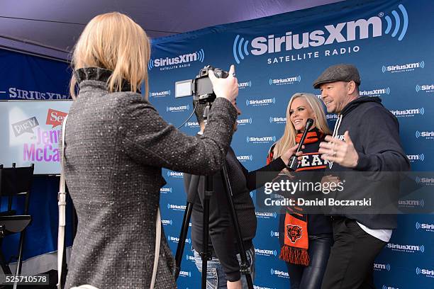 Jenny McCarthy and Donnie Wahlberg attend during Jenny McCarthy's SiriusXM show from Grant Park in Chicago, IL before the NFL Draft on April 28, 2016...