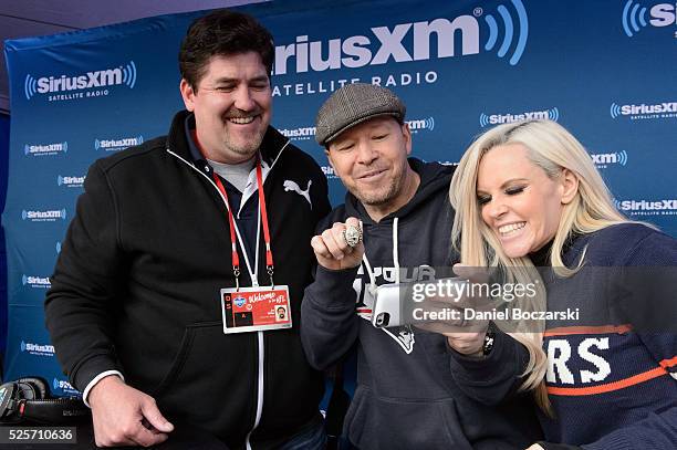 Jim Miller, Donnie Wahlberg and Jenny McCarthy attend Jenny McCarthy's SiriusXM show from Grant Park in Chicago, IL before the NFL Draft on April 28,...