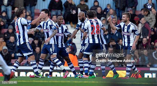 Nicolas Anelka of West Bromwich Albion turns to celebrate after he scores his goal to level the match to 1-1 Anelka makes gesture that looks like an...