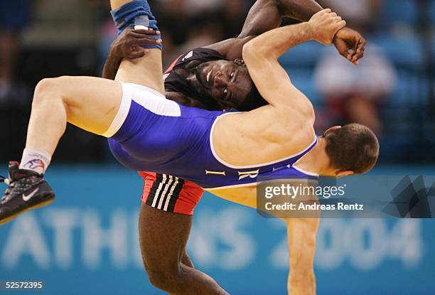 Ringen: Olympische Spiele Athen 2004, Athen; Freistil /60kg / Maenner Finale; GOLD Yandro QUINTANA / CUB, SILBER Masuod JOKAR / IRI 29.08.04.