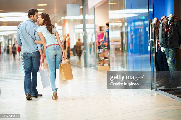 i get to choose the next store! - couple shopping in shopping mall stock pictures, royalty-free photos & images