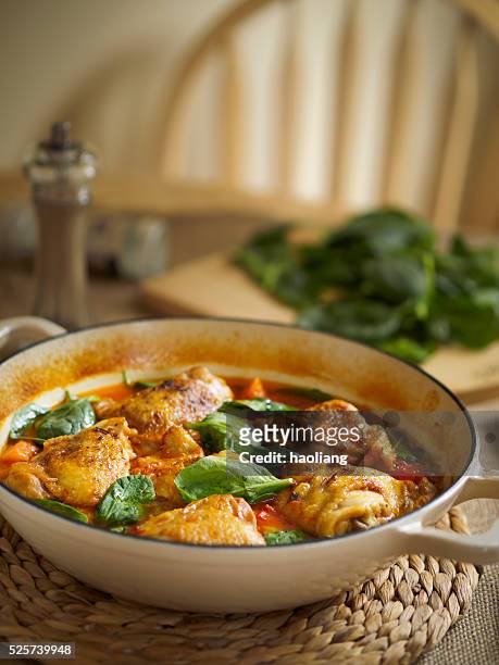 spicy chicken,spinach stew - chicken stew stock pictures, royalty-free photos & images