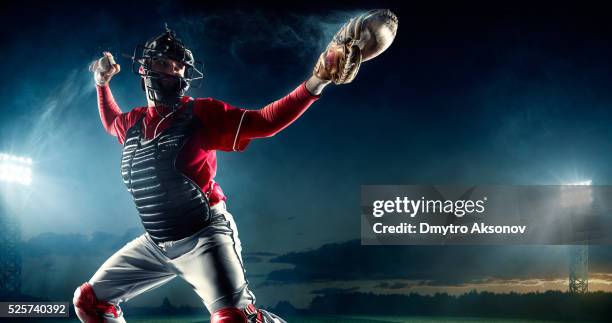 baseball catcher on stadium - baseball catcher stock pictures, royalty-free photos & images