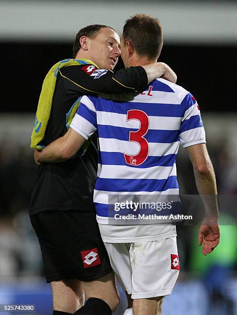 Paddy Kenny of Queens Park Rangers celebrates with Clint Hill of Queens Park Rangers