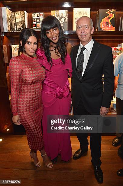 Personality Kim Kardashian, model Naomi Campbell and publisher Benedikt Taschen attend the Los Angeles launch of "Naomi" at Taschen Beverly Hills on...