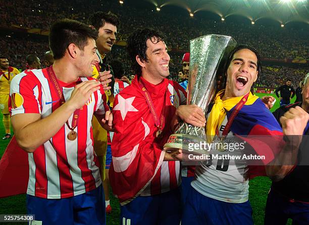 Radamel Falcao Garcia of Atletico Madrid celebrates with The UEFA Europa League Trophy after the 3-0 victory, his second victory in two seasons