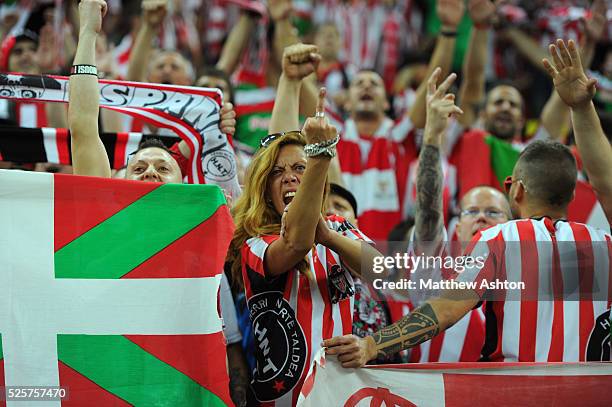 Female fan of Athletic Bilbao at the UEFA Europa League Final 2012 sticking her finger up at rivals Atletico Madrid
