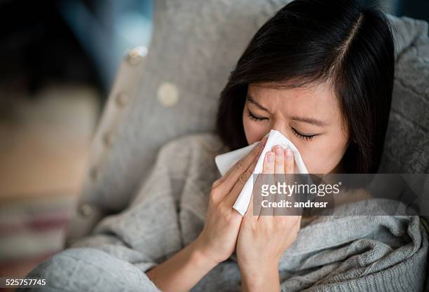 woman with the flu - flu season stock pictures, royalty-free photos & images