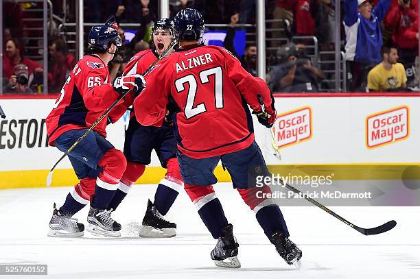 Oshie of the Washington Capitals celebrates his game winning goal and hat trick against the Pittsburgh Penguins in overtime in Game One of the...