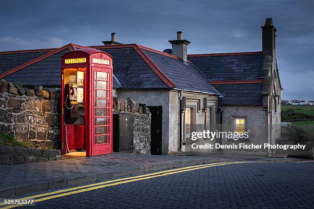 british telephone booth - bushmills stock pictures, royalty-free photos & images