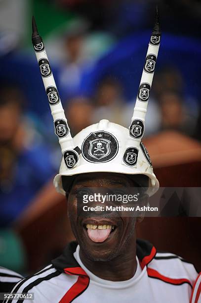 Fan of South Africa team Orlando Pirates wearing a hat