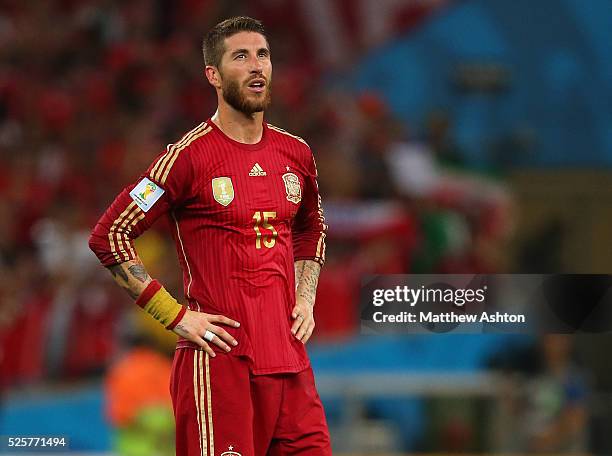 Dejected Sergio Ramos of Spain as the defending champions are knocked out of the FIFA World Cup after losing 2-0 to Chile