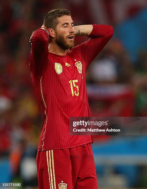 Dejected Sergio Ramos of Spain as the defending champions are knocked out of the FIFA World Cup after losing 2-0 to Chile