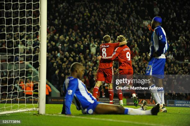 Fernando Torres of Liverpool gets congratulated by Steven Gerrard of Liverpool after scoring to make it 2-0