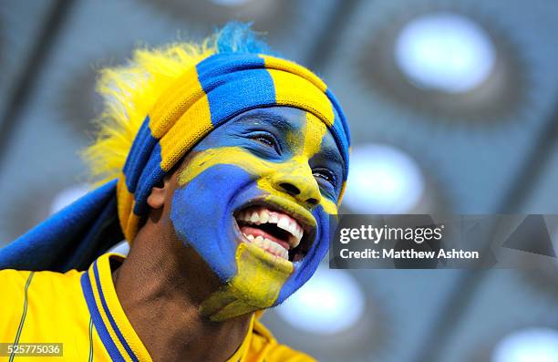 Fan of Sweden with a painted face