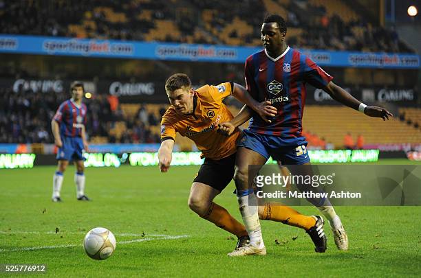 Sam Vokes of Wolverhampton Wanderers and Alassane N'Diaye of Crystal Palace