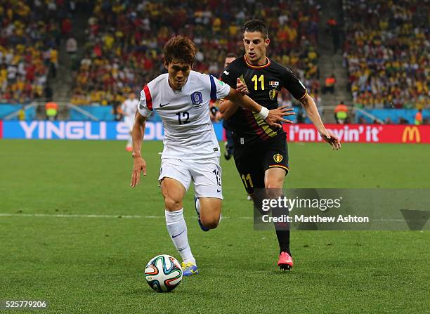 Kevin Mirallas of Belgium and Lee Yong of South Korea