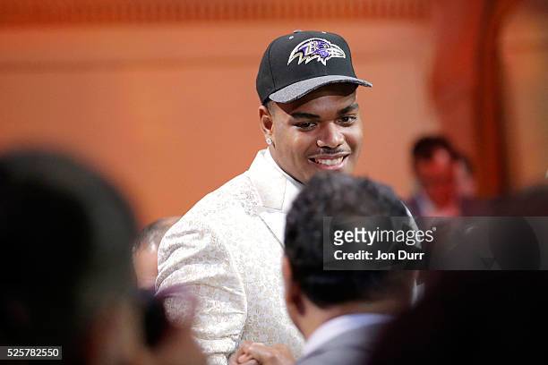 Ronnie Stanley of Notre Dame reacts after being picked overall by the Baltimore Ravens during the first round of the 2016 NFL Draft at the Auditorium...