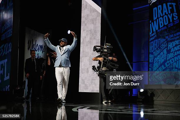 Ezekiel Elliott of Ohio State reacts after being picked overall by the Dallas Cowboys during the first round of the 2016 NFL Draft at the Auditorium...