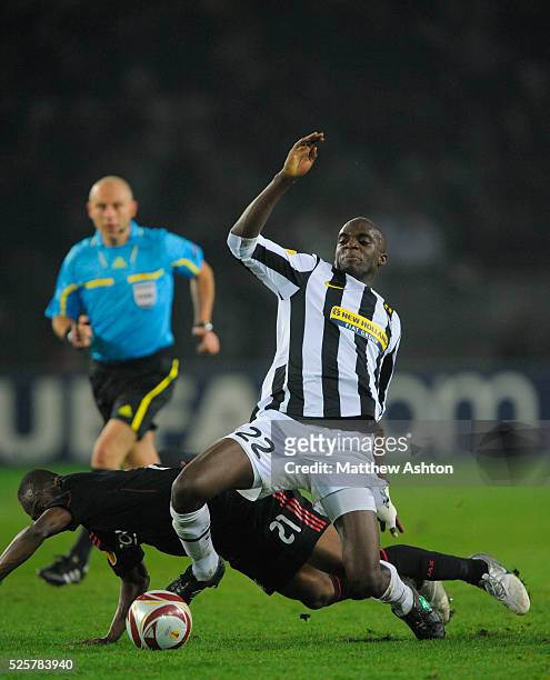 Eyong Enoh of Ajax and Mohamed Sissoko of Juventus