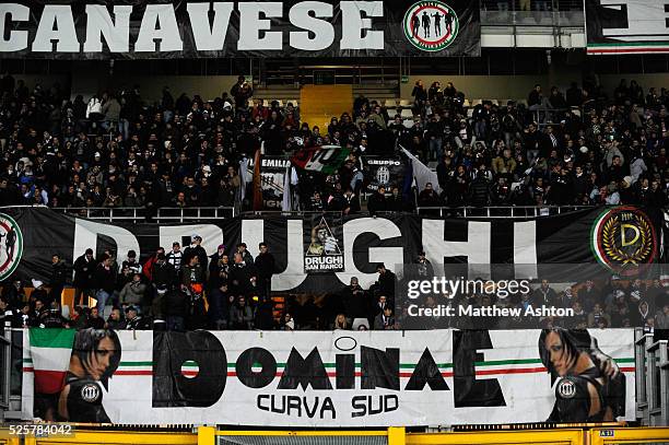 Banner with the logo of the Drughi Bianconeri, a Juventus fan group in Curva Sud in the The Olimpico di Torino stadium