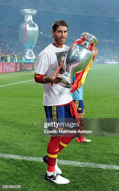 Sergio Ramos of Spain celebrates with the trophy at full-time