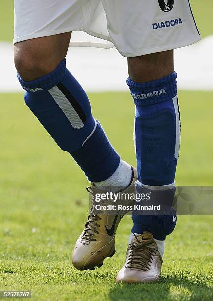 Jermaine Pennant of Birmingham City is seen with a security tag attached to his left ankle as he warms up before the Barclays Premiership match...