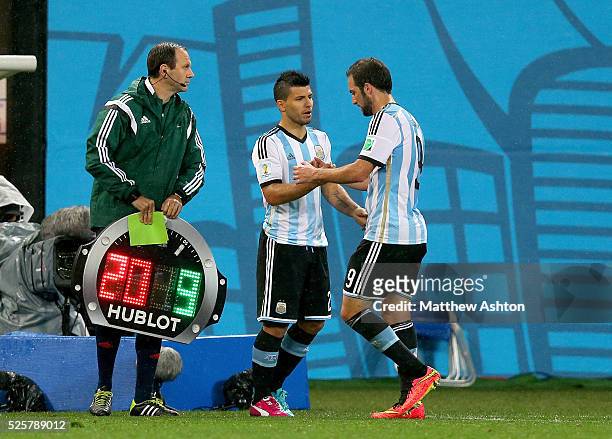 Sergio Aguero of Argentina comes on as a substitute, after having been injured for 2 weeks, to replace Gonzalo Higuain of Argentina