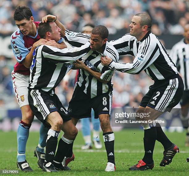 Lee Bowyer and Kieron Dyer of Newcastle come to blows during the FA Barclays Premiership match between Newcastle United and Aston Villa at St James...