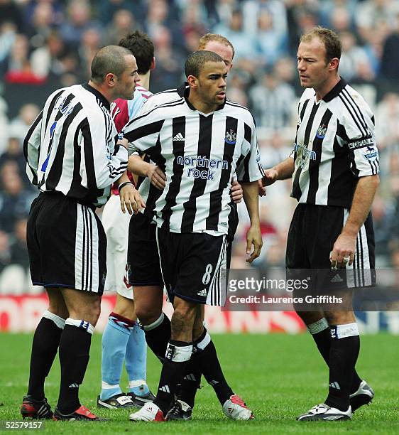 Kieron Dyer of Newcastle is held back from Lee Bowyer by Alan Shearer and Stephen Carr during the FA Barclays Premiership match between Newcastle...