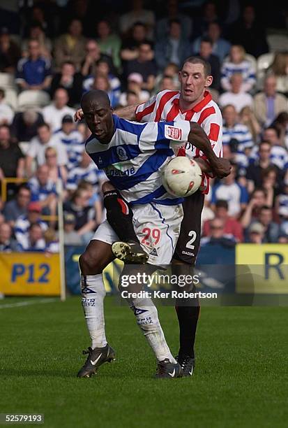 Paul Furlong of Queens Park Rangers holds off Stephen Wright of Sunderland during the Coca-Cola Championship match between Queens Park Rangers and...